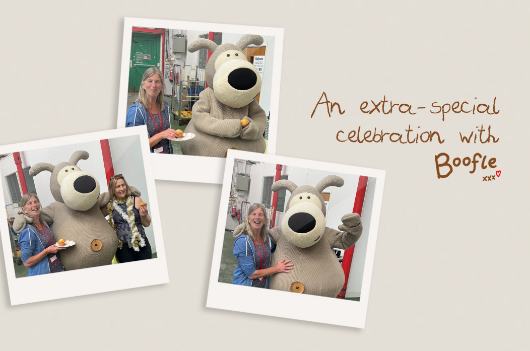 Photos of cute character Boofle with a fan